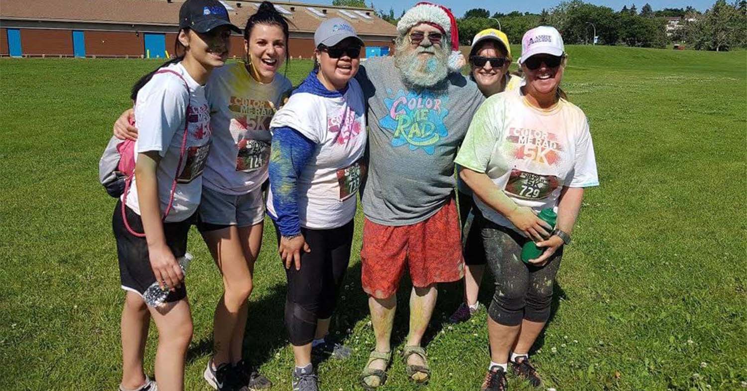 The Assiff Law team participating in Color Me Rad race.